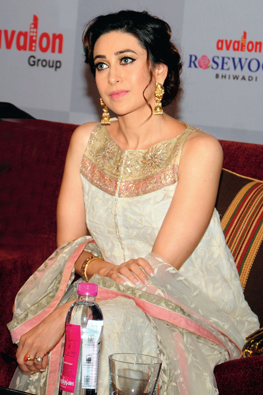 Karisma Kapoor In Short Cloths Photos